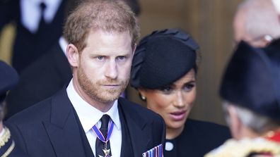 Prince Harry and Meghan, Duchess of Sussex leave Westminster Hall, London, Wednesday, Sept. 14, 2022 after the coffin of Queen Elizabeth II was brought to the hall to lie in state ahead of her funeral on Monday.