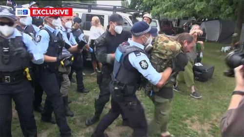 The protesters were cleared from their campsite outside the National Library.