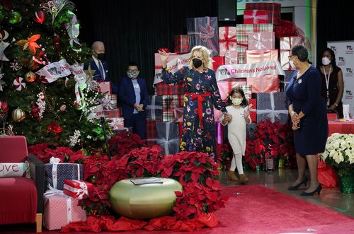 First lady Jill Biden arrives to read "Olaf's Night Before Christmas" with President Joe Biden and patients at Children's National Hospital in Washington, Friday, Dec. 24, 2021.  