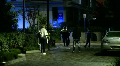 Police were called to a unit block in Zetland this morning after a woman's injured body was found on the footpath outside.