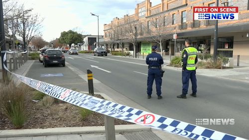 The armed man confronted police at the service station in Queanbeyan before he was shot and taken to Canberra Hospital.