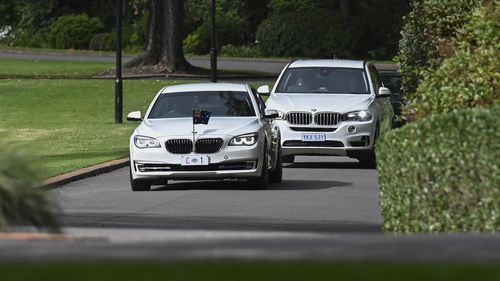 Prime Minister Scott Morrison arrives at Government House in Commonwealth car C1.