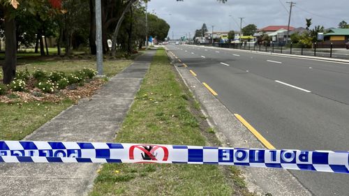 Police tape urging those near  Windang Road, Windang to avoid the area.