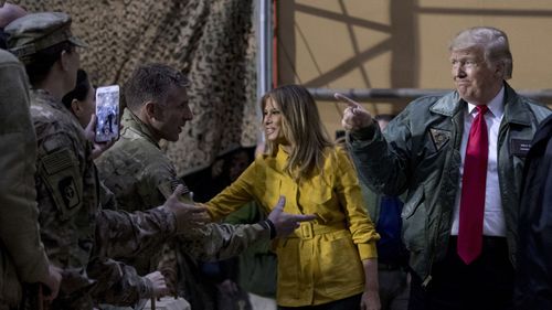 Donald Trump and Melania Trump greeting US troops in Iraq.