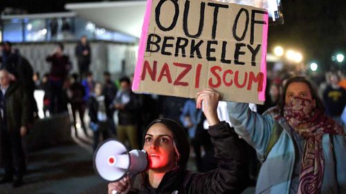 Protesters gather at University of California, Berkeley, over a speech by Milo Yiannopoulos. (AAP)