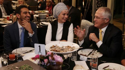 The prime minister with gold logie winner Waleed Aly (left) and his wife Susan Carland. (AAP)