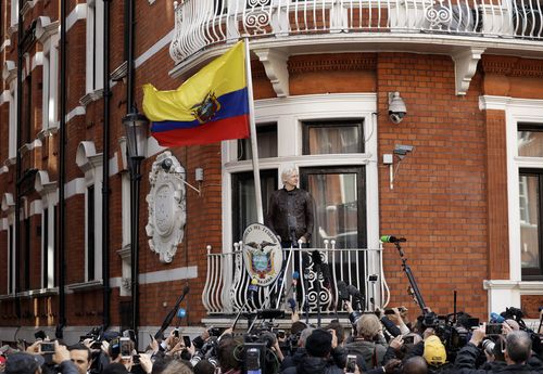 WikiLeaks founder Julian Assange gestures on the balcony of the Ecuadorian embassy prior to speaking, in London, Friday May 19, 2017. The British government on Friday, June 17, 2022 ordered the extradition of WikiLeaks founder Julian Assange to the United States to face spying charges. He is likely to appeal. 
