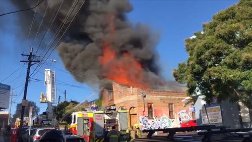 Fire broke out at the Camperdown factory about 9.30am. Picture: 9NEWS