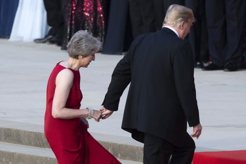 Mr Trump leads Ms May into Blenheim Palace. Picture: AAP