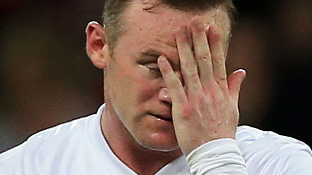 Wayne Rooney has apologised for 'inappropriate' images. (AAP)