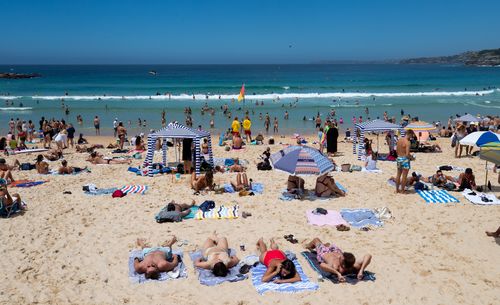 People enjoying the warm weather at Bondi Beach at the weekend.