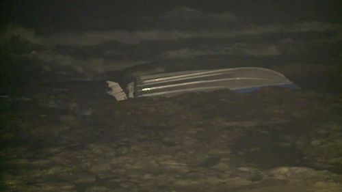 Three rescued after boat capsized near rocks off Sydney’s Cronulla Beach