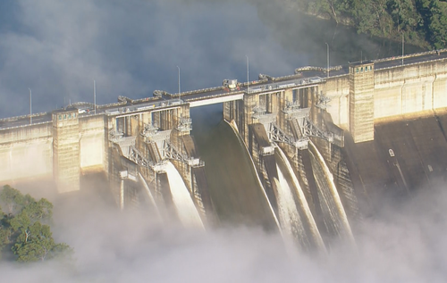 Intense rain has led Warragamba Dam to reach capacity and spill over