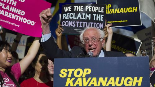 Senator Bernie Sanders speaks at a rally in Washington DC opposing Brett Kavanaugh. (AAP)