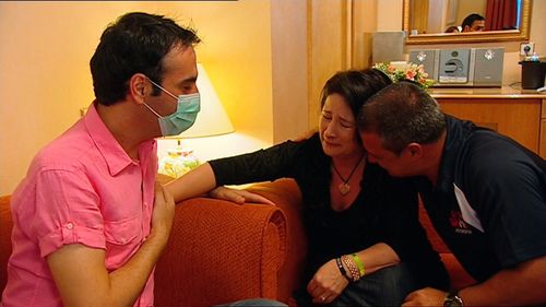 Doujon's parents feel their son's heart beat in Kosta's chest.