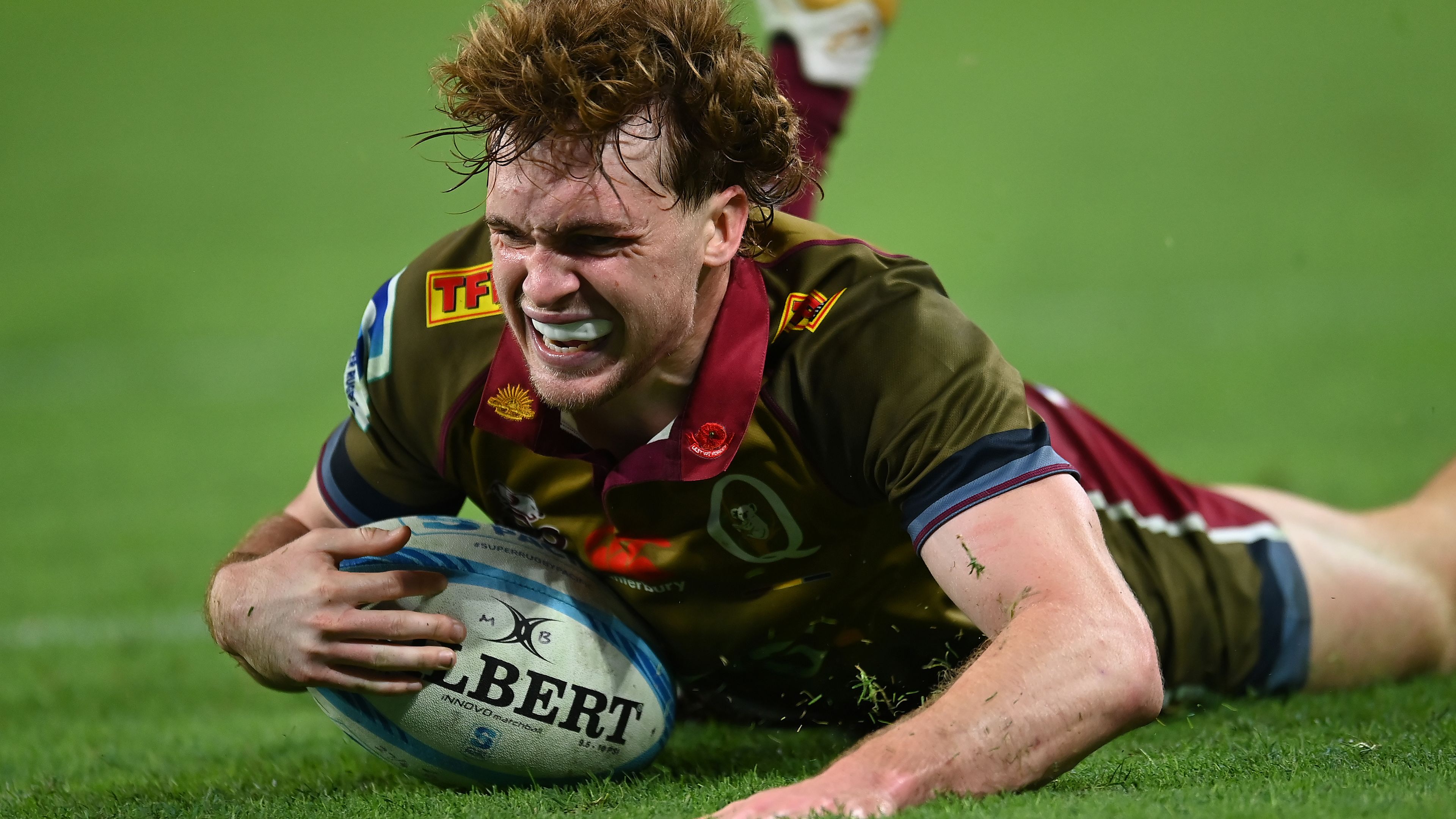Tim Ryan of the Reds scores a try during the round 10 Super Rugby Pacific match between Queensland Reds and Blues.