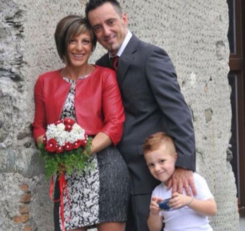 Roberto Robbiano, 43, centre, Ersilia Piccinino, 41, and their nine-year old son Samuele.