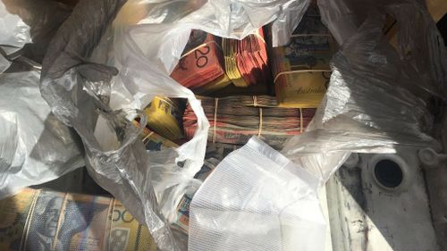 Man charged after nearly $300,000 in cash found in van in NSW