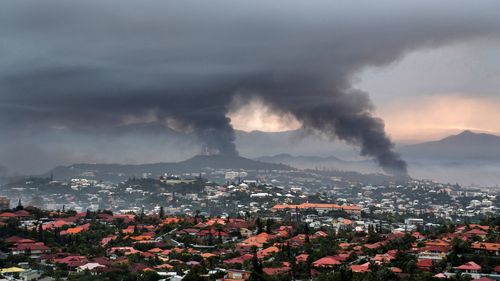 Smoke rises during protests in Noumea, New Caledonia on Wednesday last week.