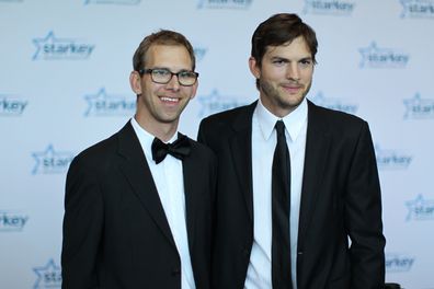 Michael Kutcher and Ashton Kutcher walk the red carpet before the 2013 Starkey Hearing Foundation's "So the World May Hear" Awards Gala on July 28, 2013 in St. Paul, Minnesota. 