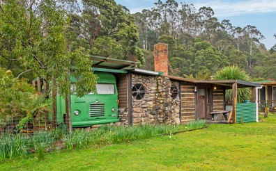 Three bed shack with converted bus in Tasmania on offer for $65,000. 