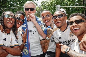 Real Madrid manager Carlo Ancelotti sparks up a cigar after winning La Liga.