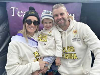 Laura and Dave Tucker with their son Jackson Bailey at Relay For Life in 2024.