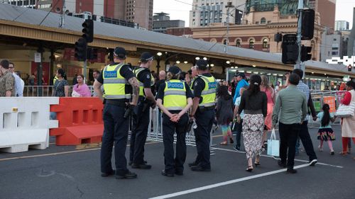 Police were out in force during last night's New Year's Eve celebrations across the city. (Image: AAP)