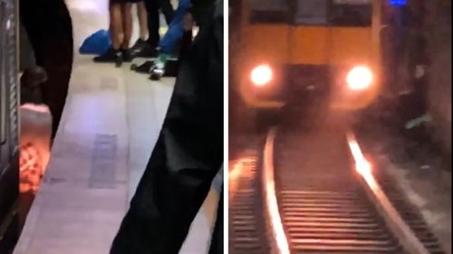 Sydney train nearly crashes into commuter who has called onto tracks.