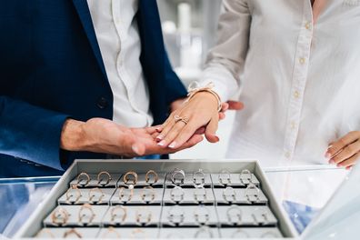 Couple choosing engagement ring