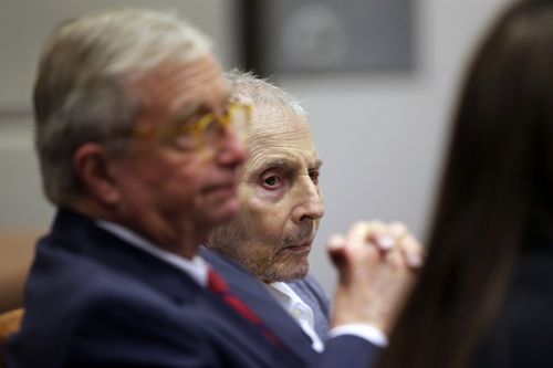 Robert Durst, right, sits with his defense attorney Dick DeGuerin during his murder trial in Los Angeles, Tuesday, March 10, 2020. 