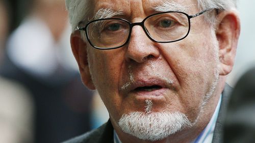 Rolf Harris pleads not guilty to seven counts of indecent assault and one count of sexual assault