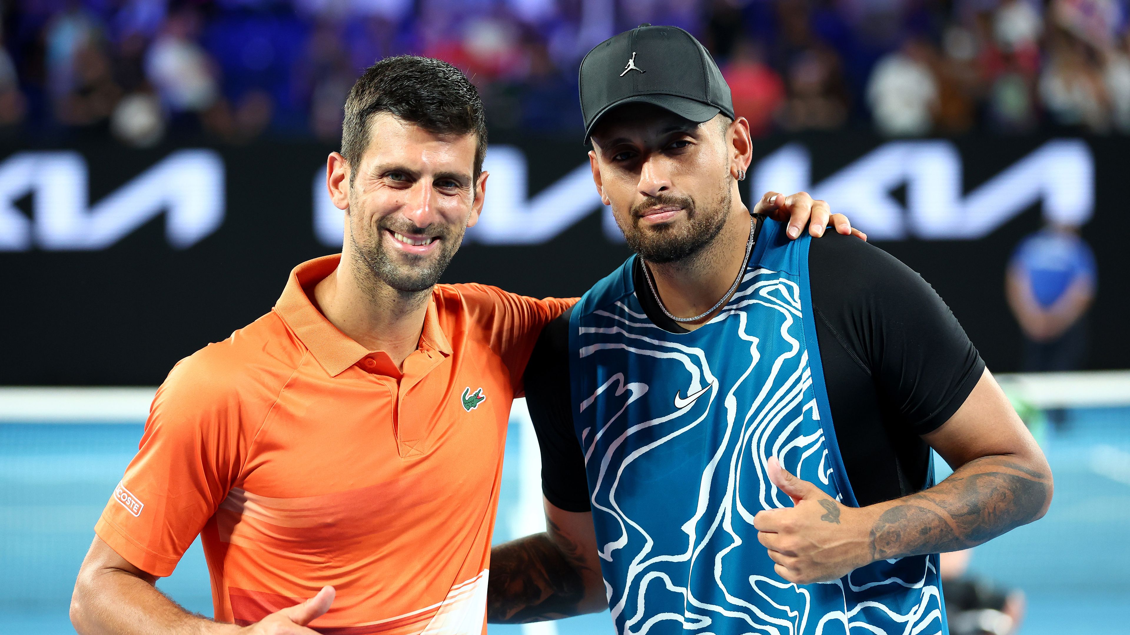 Novak Djokovic and Nick Kyrgios pose for a photo following their Arena Showdown charity match.