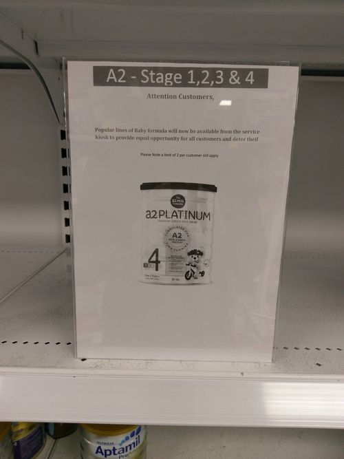 A photograph published on Reddit shows a sign at a Coles store indicating the baby formula had been moved. (Supplied)