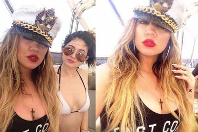 Our fave Kardashian proved that she's not leaving her fave red lip at home, even when in laidback thailand.