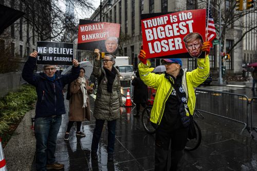 Protestors demonstrate outside Federal Court, Thursday, Jan. 25, 2024, in New York.  