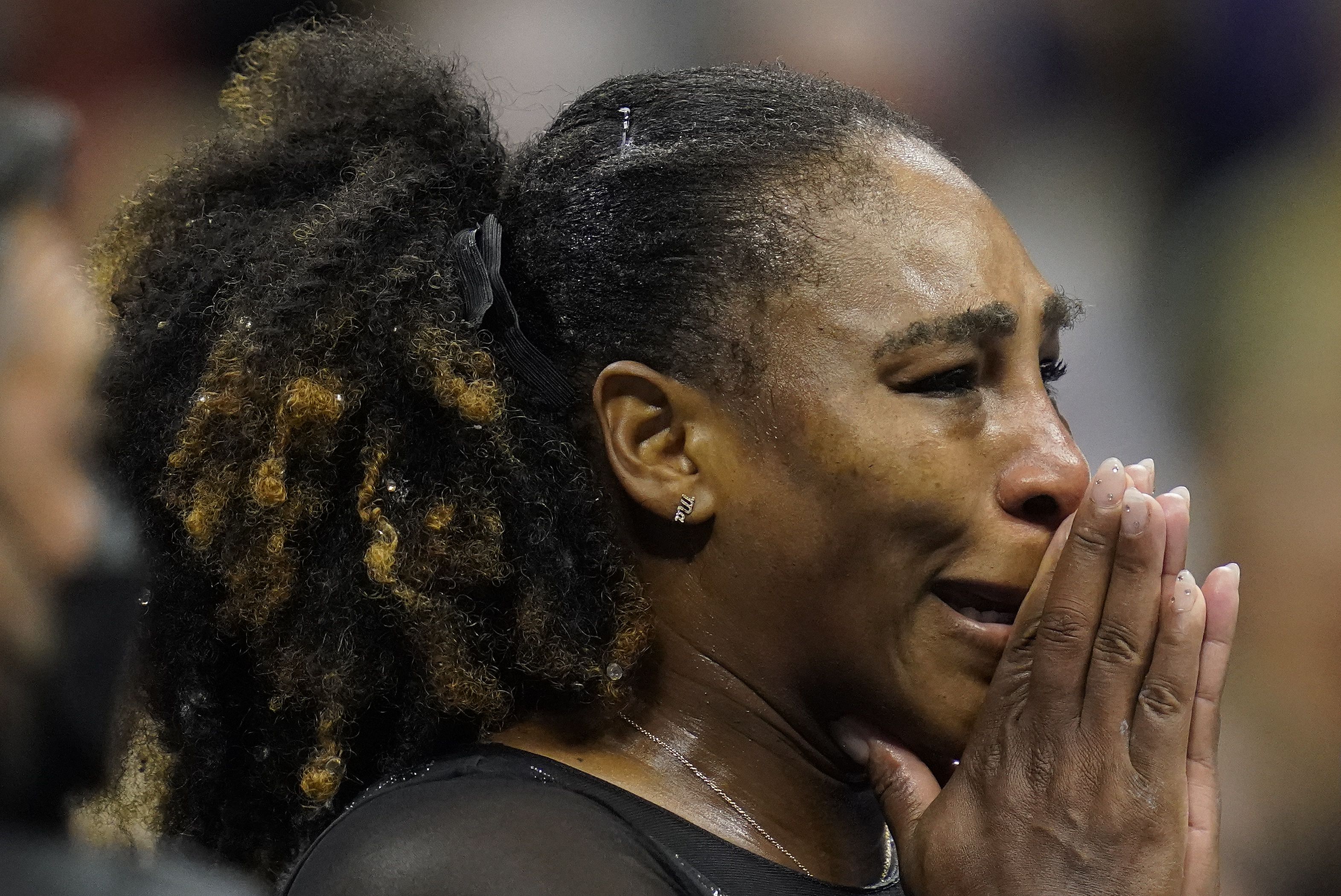 Serena Williams reacts after losing to Aussie Ajla Tomljanovic  in the third round of the U.S. Open tennis championships, Friday, Sept. 2, 2022, in New York. (AP Photo/Charles Krupa)