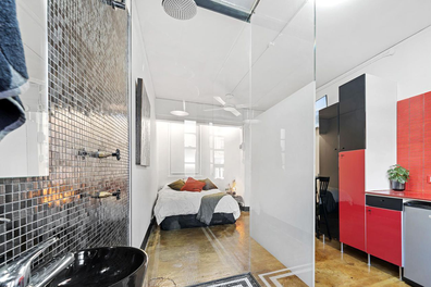 Tiny studio apartment in Sydney with the toilet seat opposite the stove has found a tenant at $520-per-week.