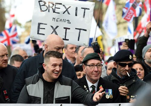 Far-right leader Tommy Robinson with UK Independence Party (UKIP) and pro Brexit supporters during UKIP Brexit betrayal march in London, England. 