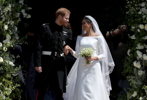 Prince Harry and Meghan Markle leave St George's Chapel in Windsor Castle after their wedding on May 19. Picture: AAP