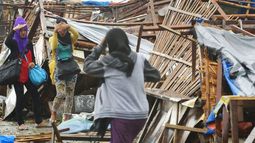 Millions hunker down in Philippine capital