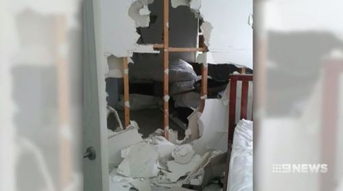 The partygoers destroyed walls in the house.