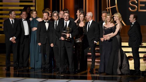 The cast and crew of Breaking Bad accept their award for most outstanding drama.