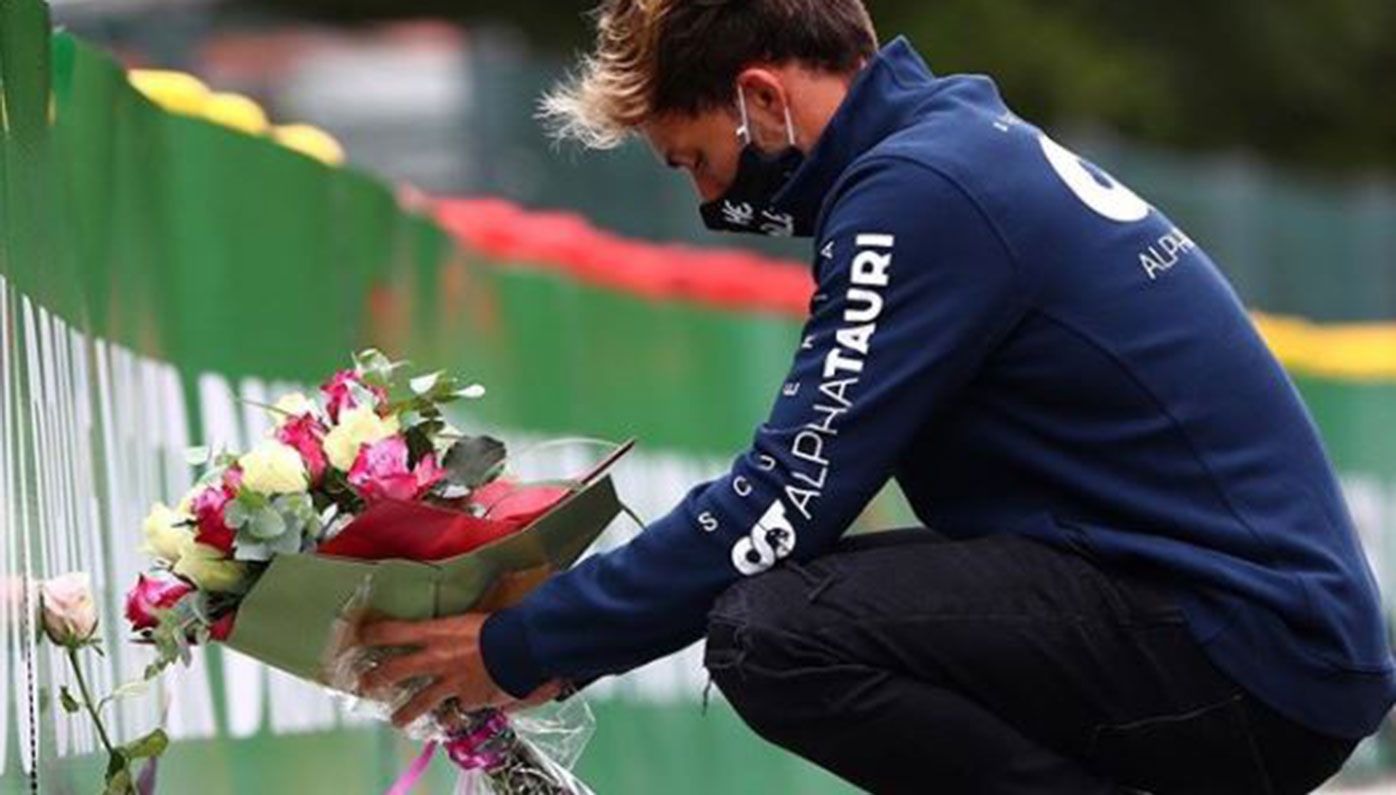 Formula One driver Pierre Gasly lays flowers at the site of Anthoine Hubert&#x27;s fatal accident.