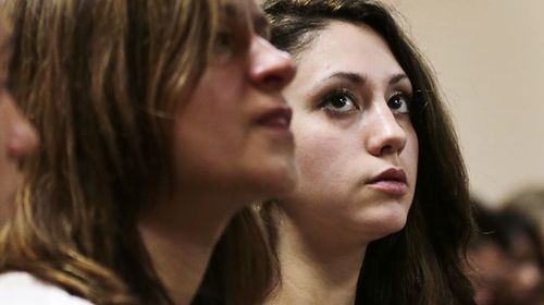 Abby Hernandez sits beside her mother in court. (AAP)