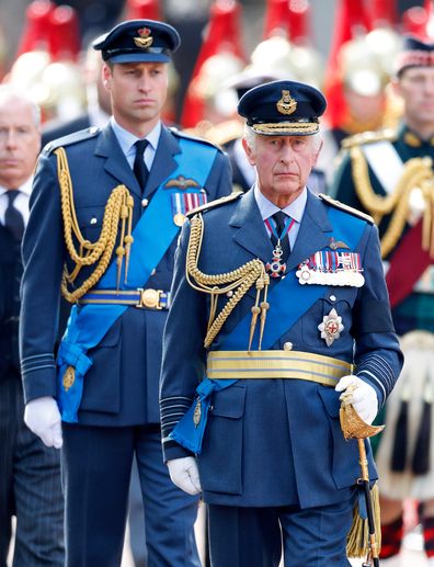 Prince William, Prince of Wales and King Charles III walk behind Queen Elizabeth II's coffin ahead of her Lying-in-State on September 14, 2022 in London, United Kingdom. 