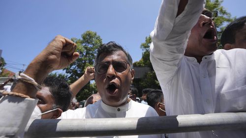 Sri Lankan opposition lawmakers have joined protests in Colombo in defiance of the recently imposed state of emergency and curfew. 