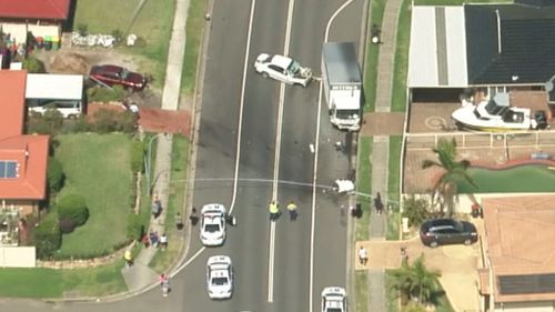 Police have closed down Bennett Rd to investigate and clear debris. (9NEWS)