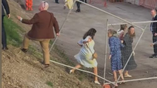 Some passengers were so frustrated with the delay, they pried the doors open with bare hands and jumped down onto the tracks at Flemington.