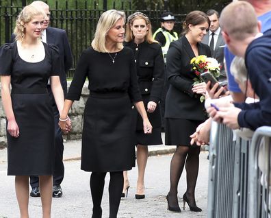 From left, Britain's Prince Edward, Lady Louise Windsor, Sophie Countess of Wessex, Princess Beatrice and Princess Eugenie view floral tributes for Queen Elizabeth II outside the gates of Balmoral Castle in Aberdeenshire, Scotland Saturday, Sept. 10, 2022.  